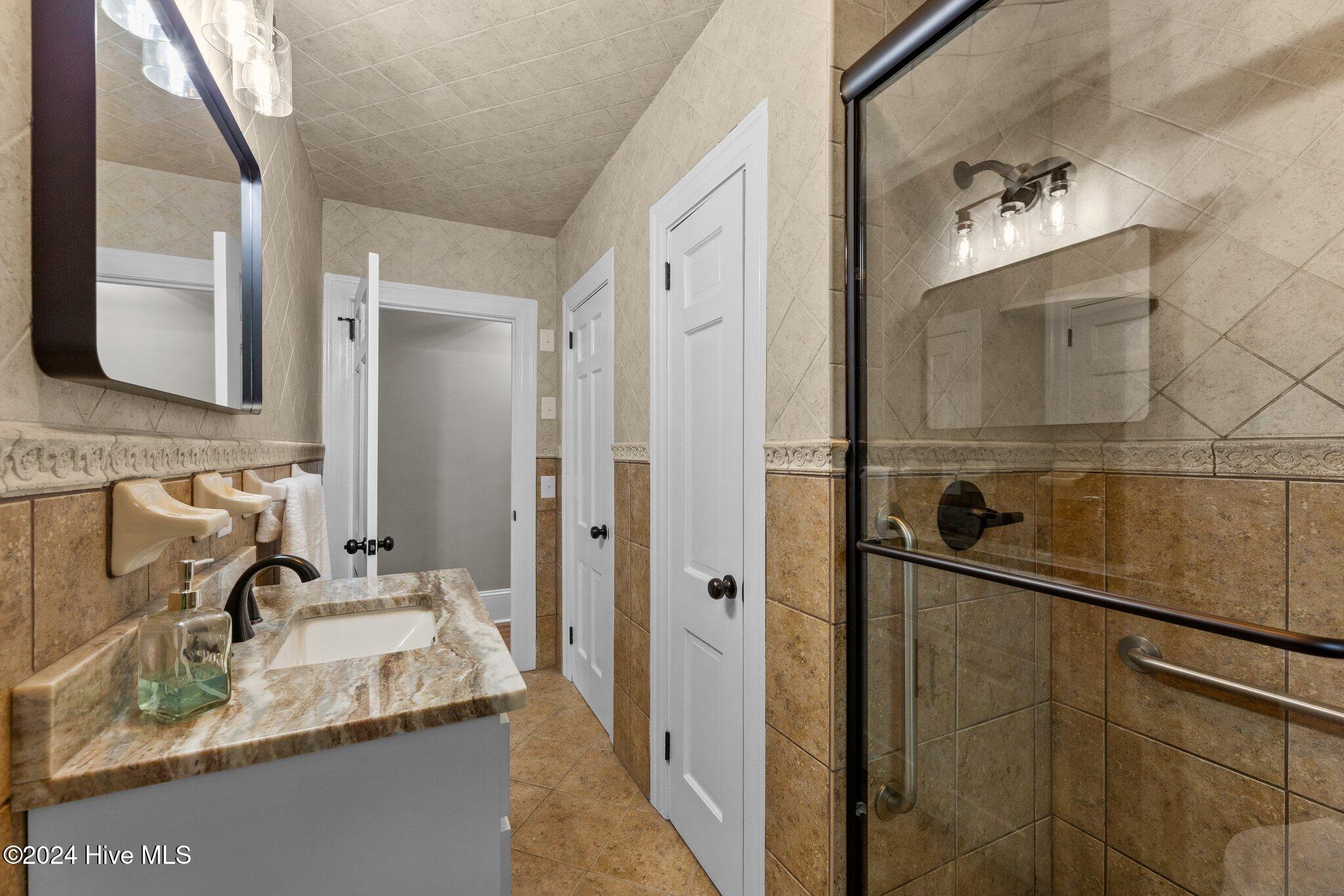 8972 Lancaster Store Road Castalia, NC 27816 - Photo 26 of 59 Downstairs Hall Bath