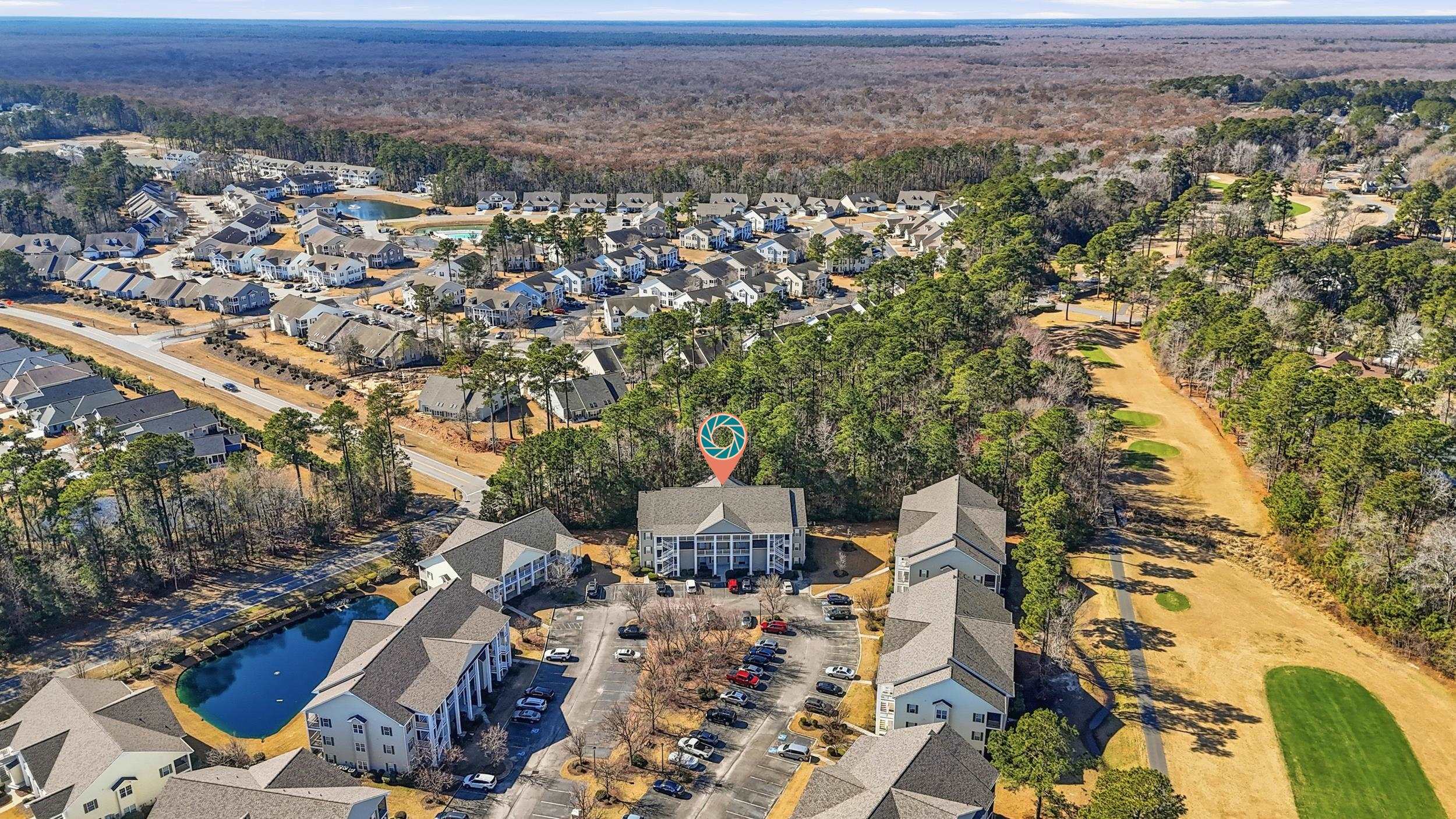 5870 Longwood Drive, Unit 203 Murrells Inlet, SC 29576 - Photo 32 of 32 Aerial view of property's location with nearby suburban area