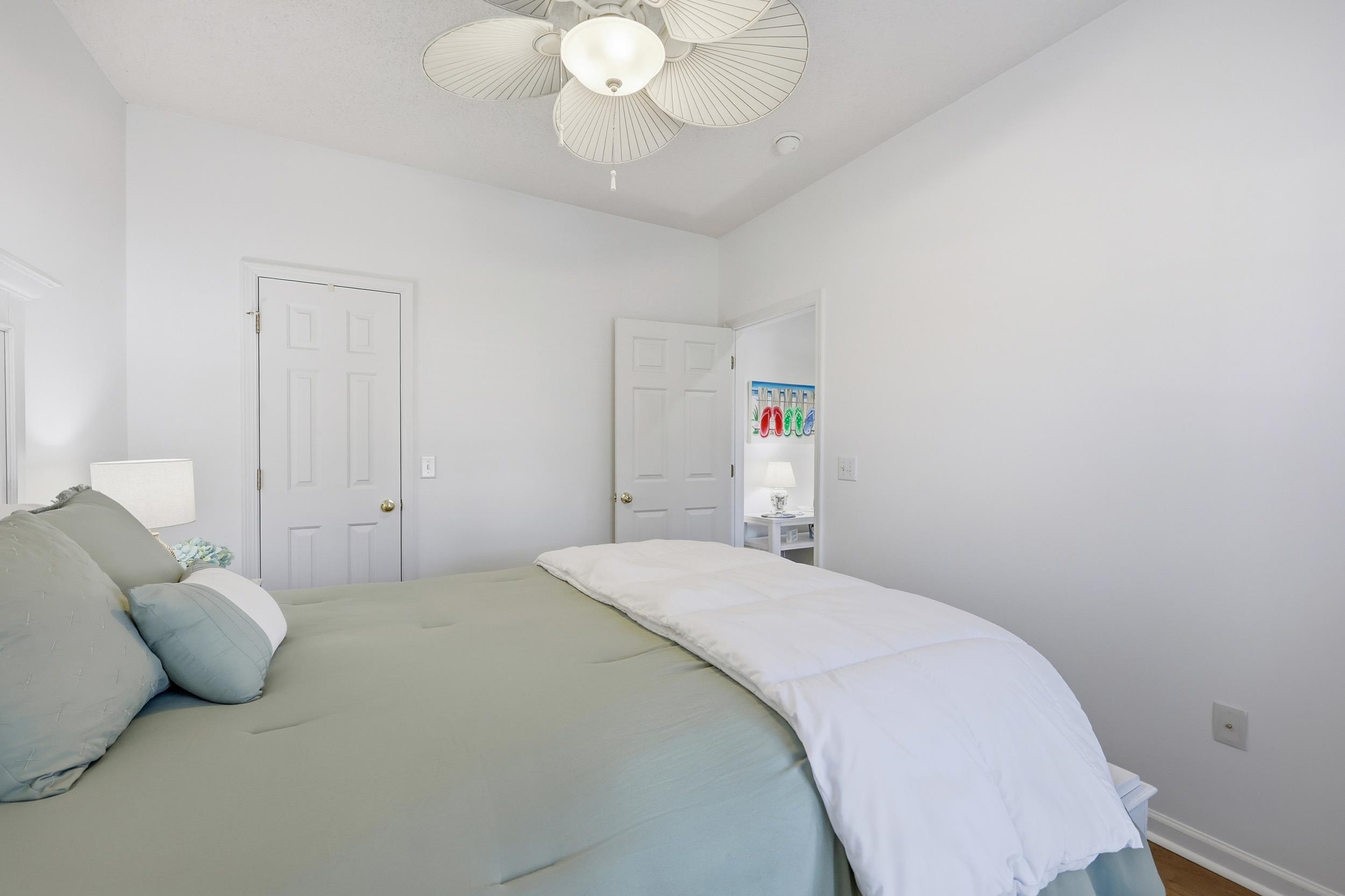 5870 Longwood Drive, Unit 203 Murrells Inlet, SC 29576 - Photo 6 of 32 Bedroom with baseboards and a ceiling fan