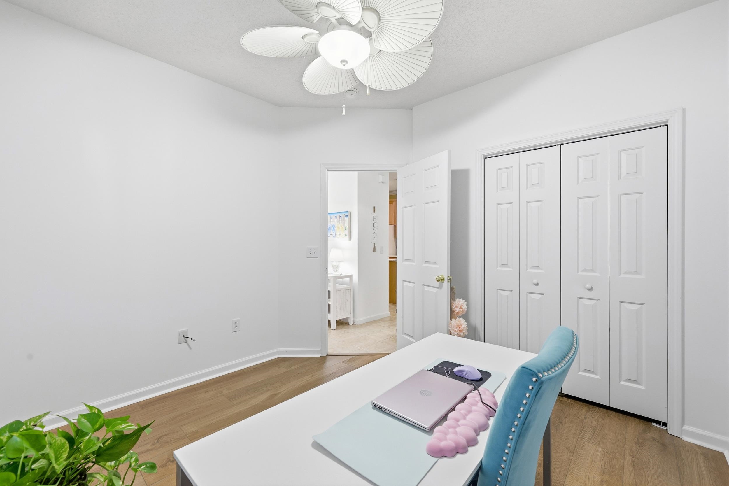 5870 Longwood Drive, Unit 203 Murrells Inlet, SC 29576 - Photo 8 of 32 Office with light wood-style floors and ceiling fan