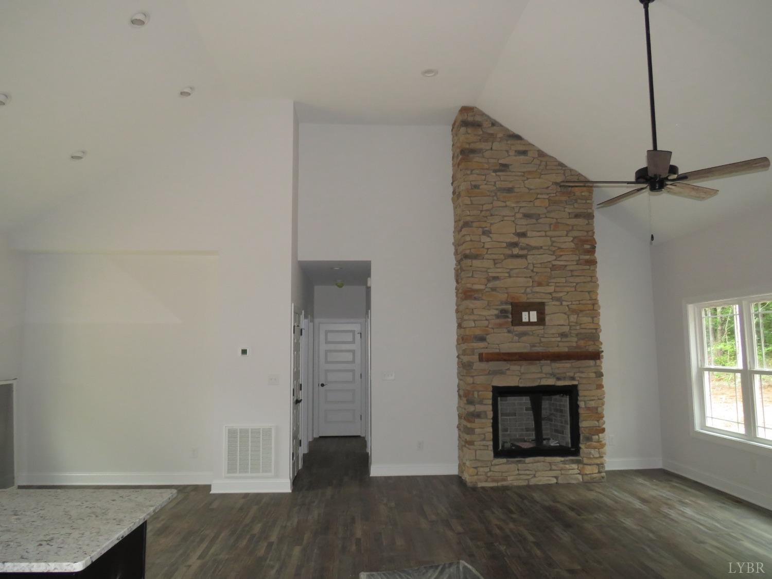 40 Hawkins Road Evington, VA 24550 - Photo 7 of 14 a view of a livingroom with a fireplace