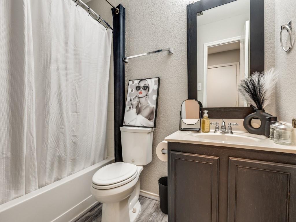 147 Washington Way Venus, TX 76084 - Photo 19 of 24 a bathroom with a toilet sink and shower