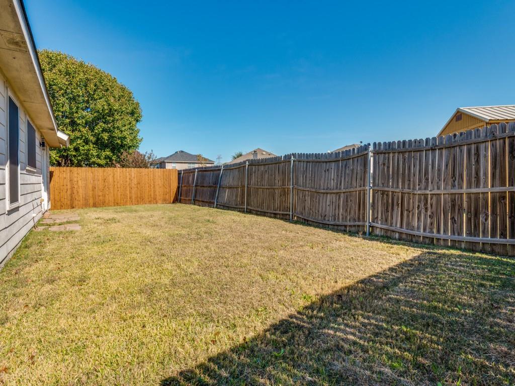 147 Washington Way Venus, TX 76084 - Photo 24 of 24 a view of backyard with wooden fence
