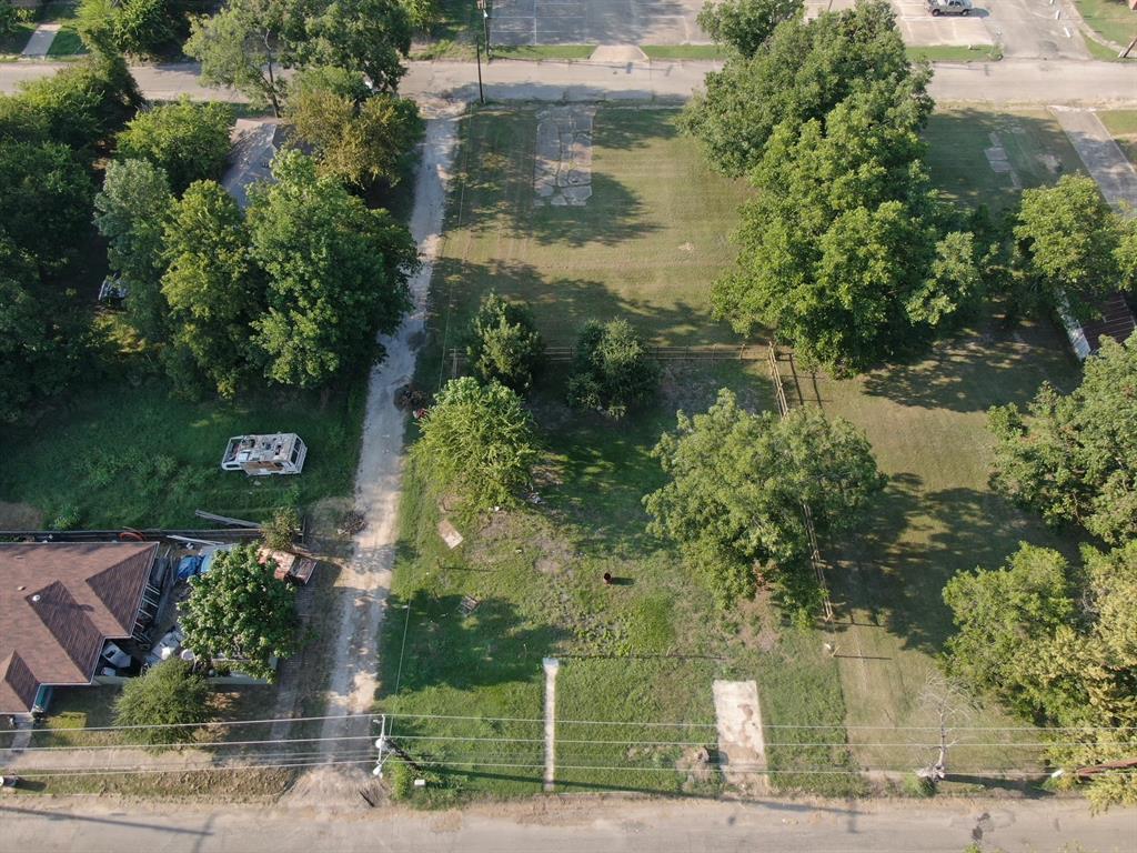 401 East Waco Avenue Cooper, TX 75432 - Photo 6 of 6 an aerial view of a house with yard