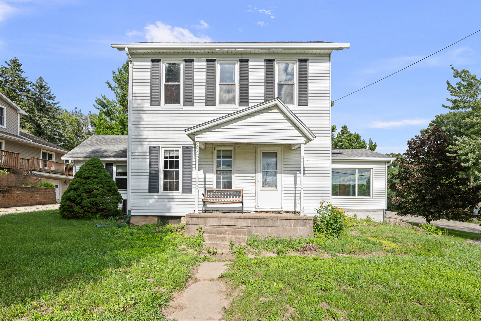 802 North High Street Port Byron, IL 61275 - Photo 9 of 43 front view of a house with a yard