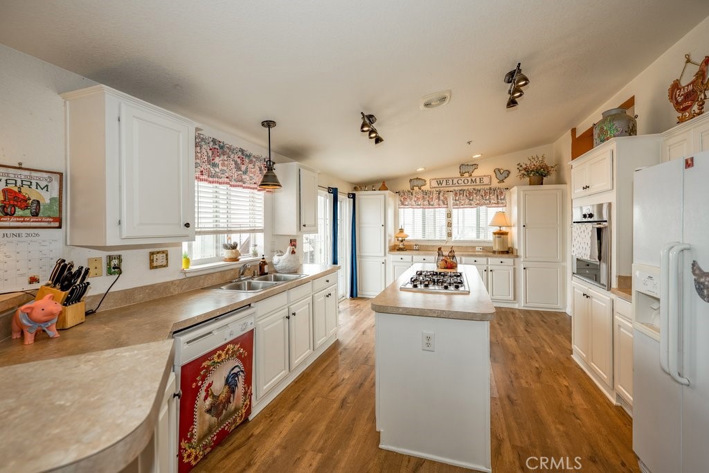33330 Palen Road Agua Dulce, CA 91390 - Photo 4 of 56 a kitchen with stainless steel appliances granite countertop a sink stove and refrigerator
