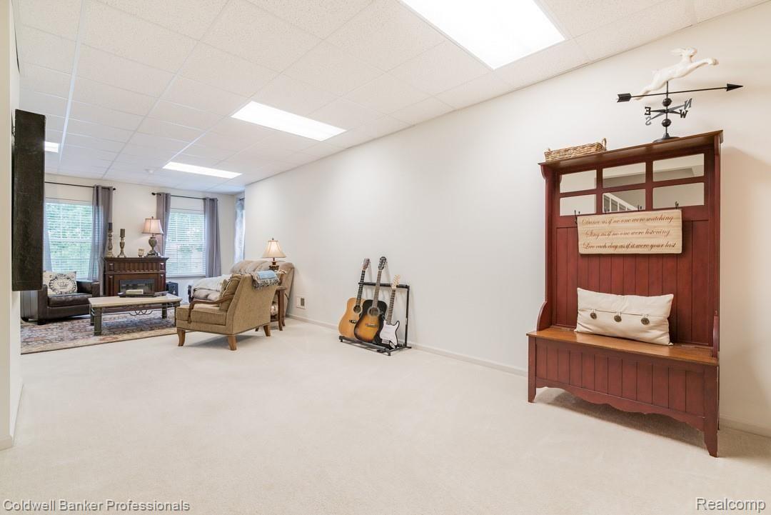 759 East Bluff Court Rochester, MI 48306 - Photo 28 of 44 Finished basement with a walkout