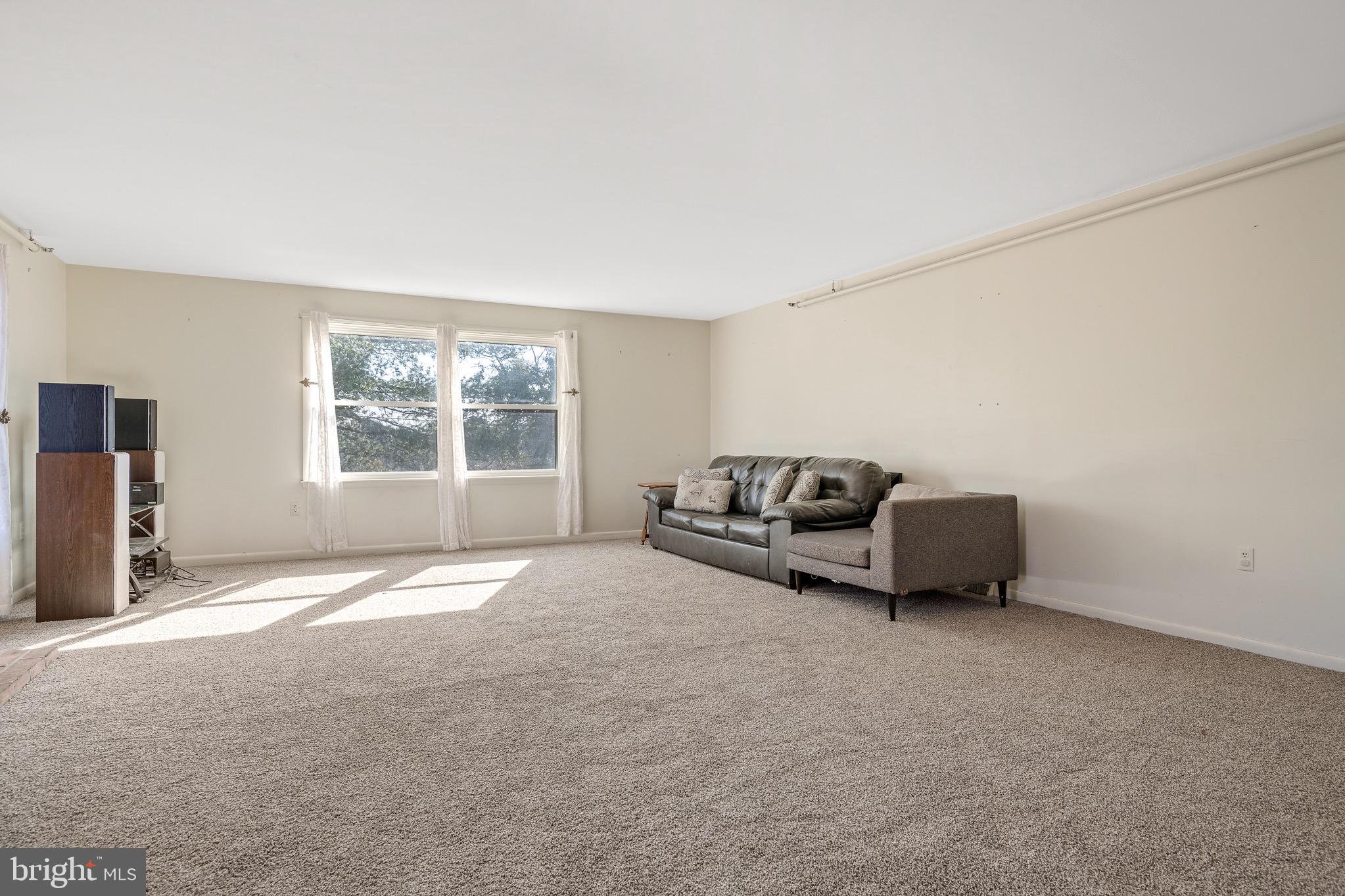 130 Delp Road Lancaster, PA 17601 - Photo 15 of 49 Large living room upstairs facing the back of home
