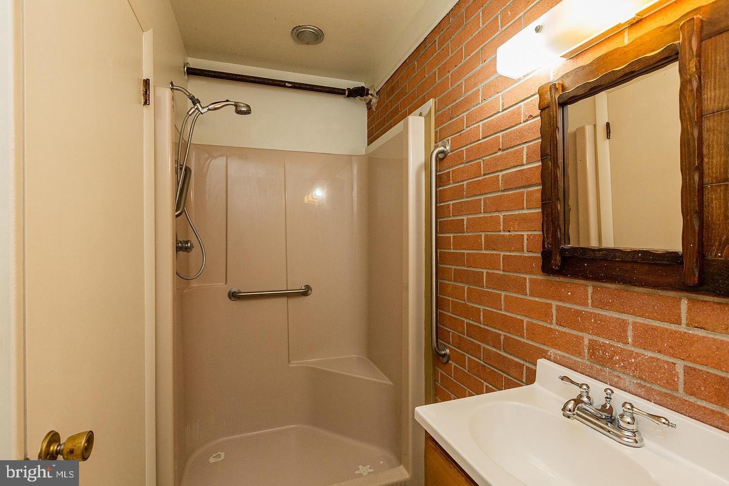 130 Delp Road Lancaster, PA 17601 - Photo 19 of 49 1st Full bathroom on the first floor off of the LR