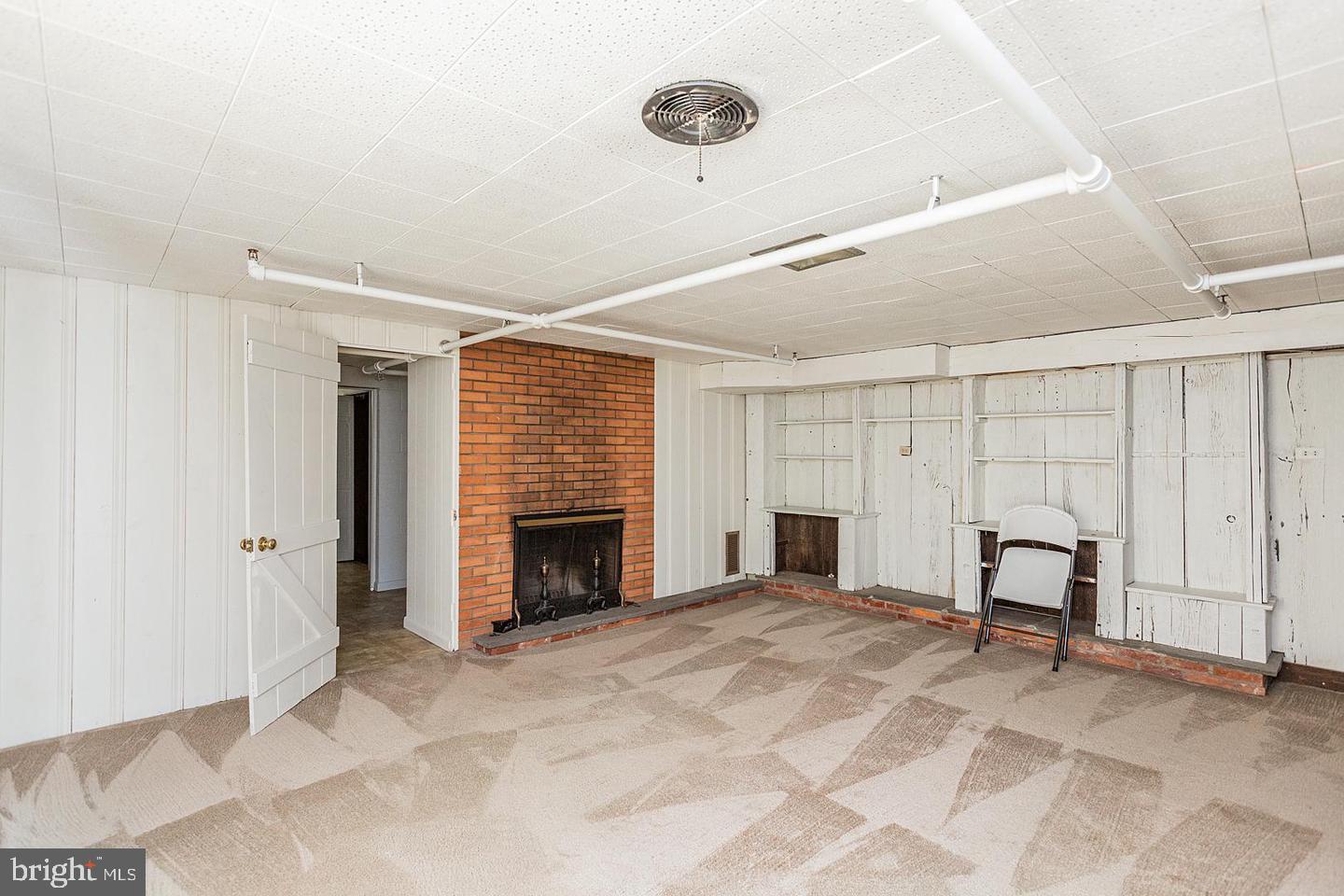 130 Delp Road Lancaster, PA 17601 - Photo 35 of 49 Basement Den with Wood burning fireplace