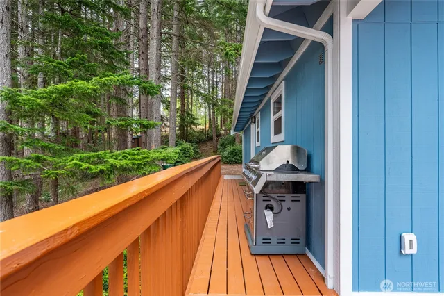 a view of balcony with furniture