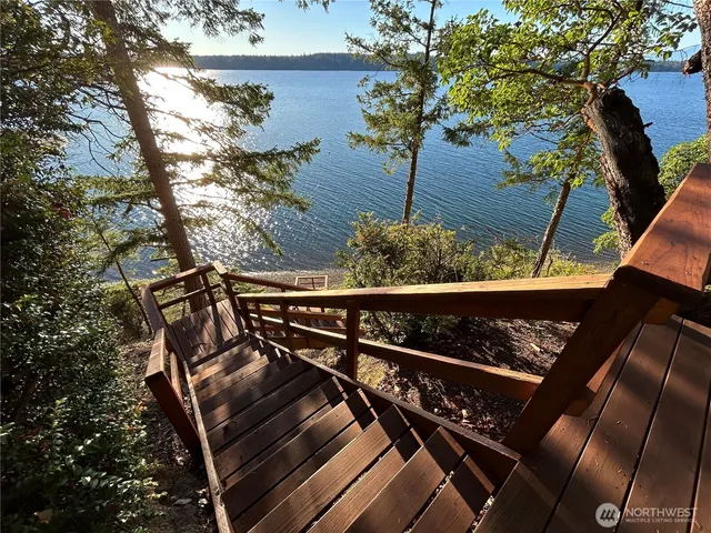 a view of a chairs and table on the wooden floor