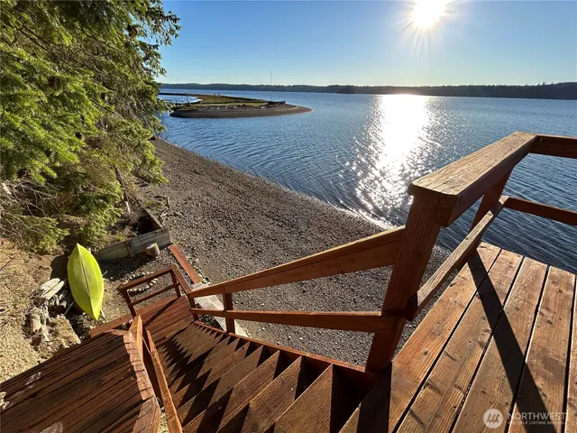 a view of a balcony with chairs
