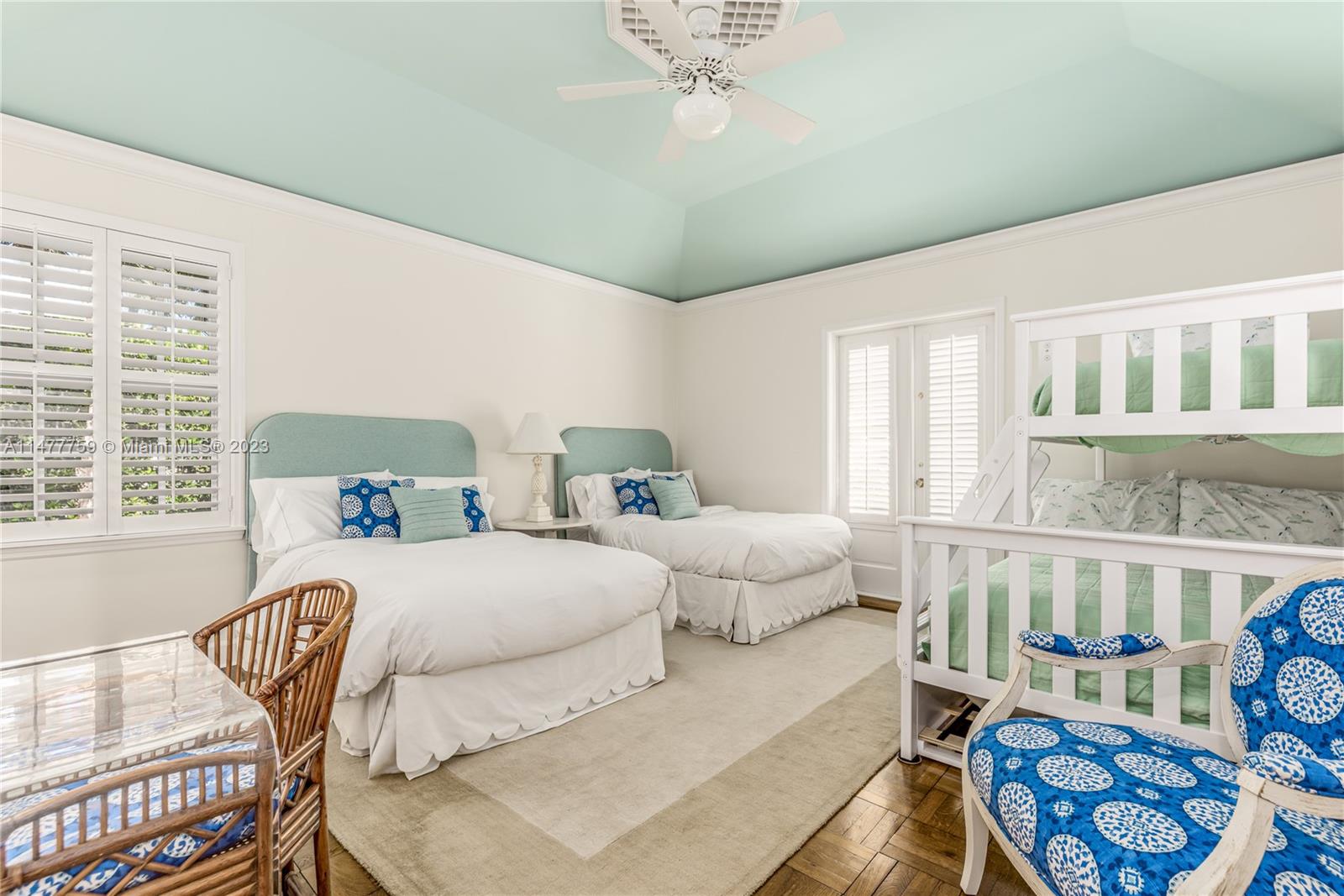 111 Gomez Road Hobe Sound, FL 33455 - Photo 11 of 16 a bedroom with furniture and a large window