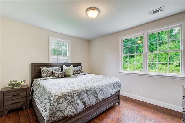 a bathroom with a shower and toilet