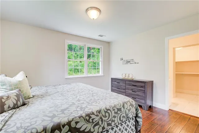 a en suite bathroom with a sink and a mirror