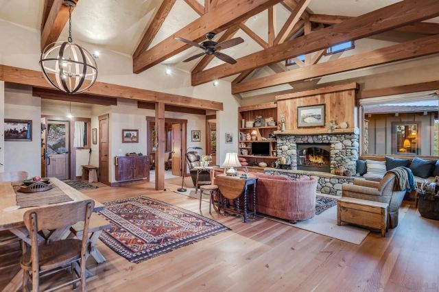 a living room with furniture and a table