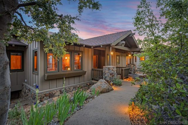 a front view of a house with patio