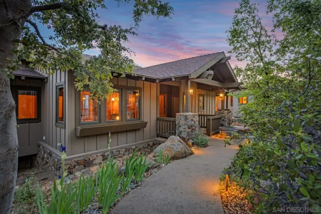 a front view of a house with patio