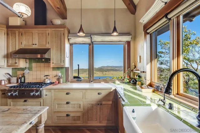 a view of a livingroom with furniture and a window