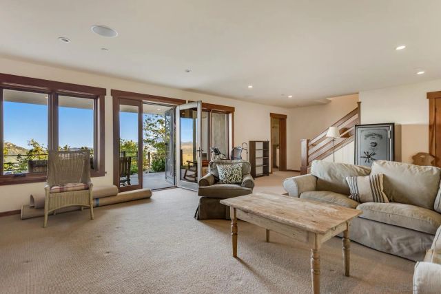 a kitchen with a sink and a large window