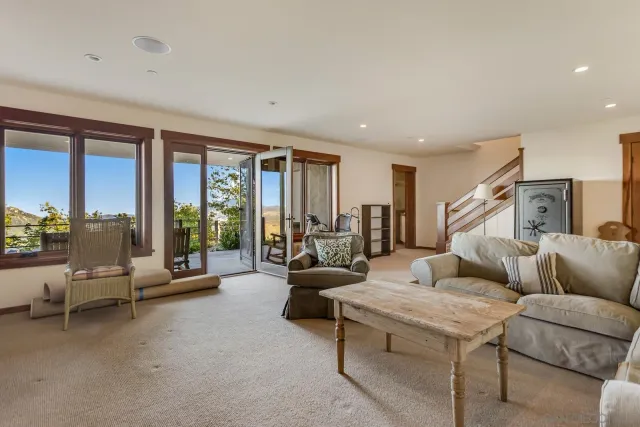 a kitchen with a sink and a large window