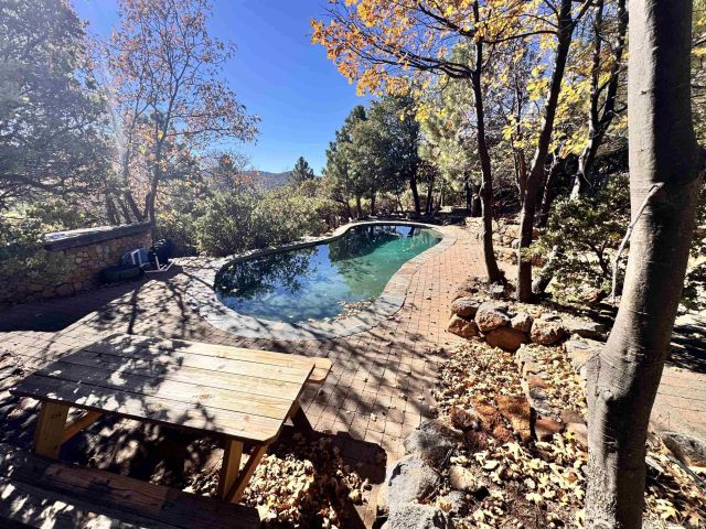 a aerial view of a house with mountain view