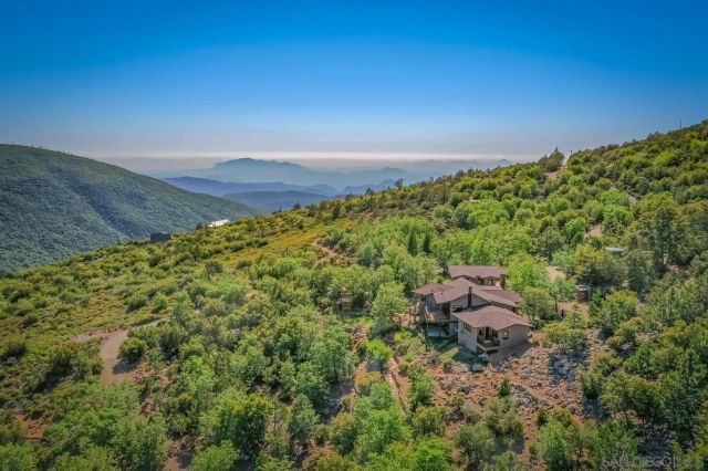 a view of an outdoor space with mountain view