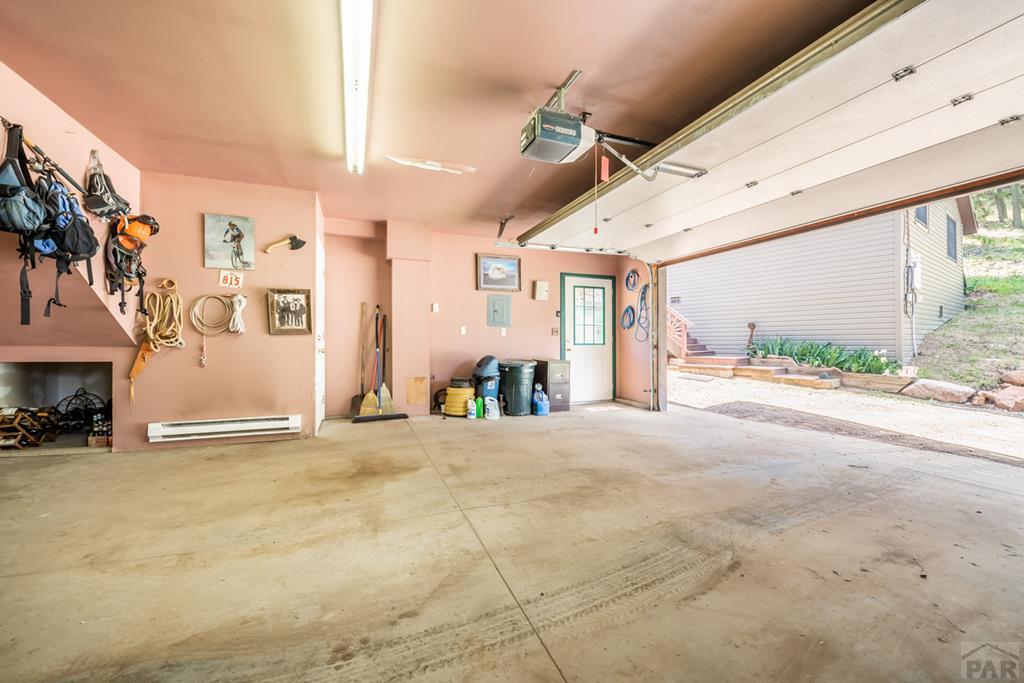 9600 Middle Creek Canyon Road Beulah, CO 81023 - Photo 46 of 50 a view of a building with stairs and a fireplace