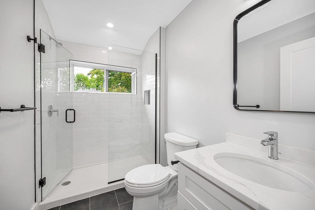 1514 Gorham Street, Unit 4 Lowell, MA 01852 - Photo 22 of 42 a bathroom with a sink toilet and shower