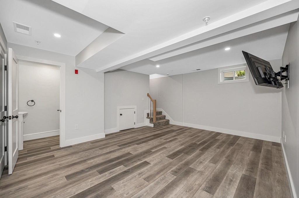 1514 Gorham Street, Unit 4 Lowell, MA 01852 - Photo 28 of 42 a view of a livingroom with an empty space