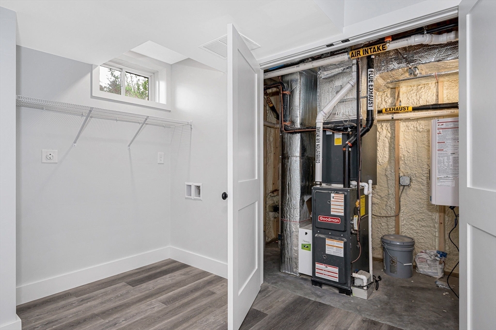 1514 Gorham Street, Unit 4 Lowell, MA 01852 - Photo 32 of 42 a view of an entryway with wooden floor and a livingroom