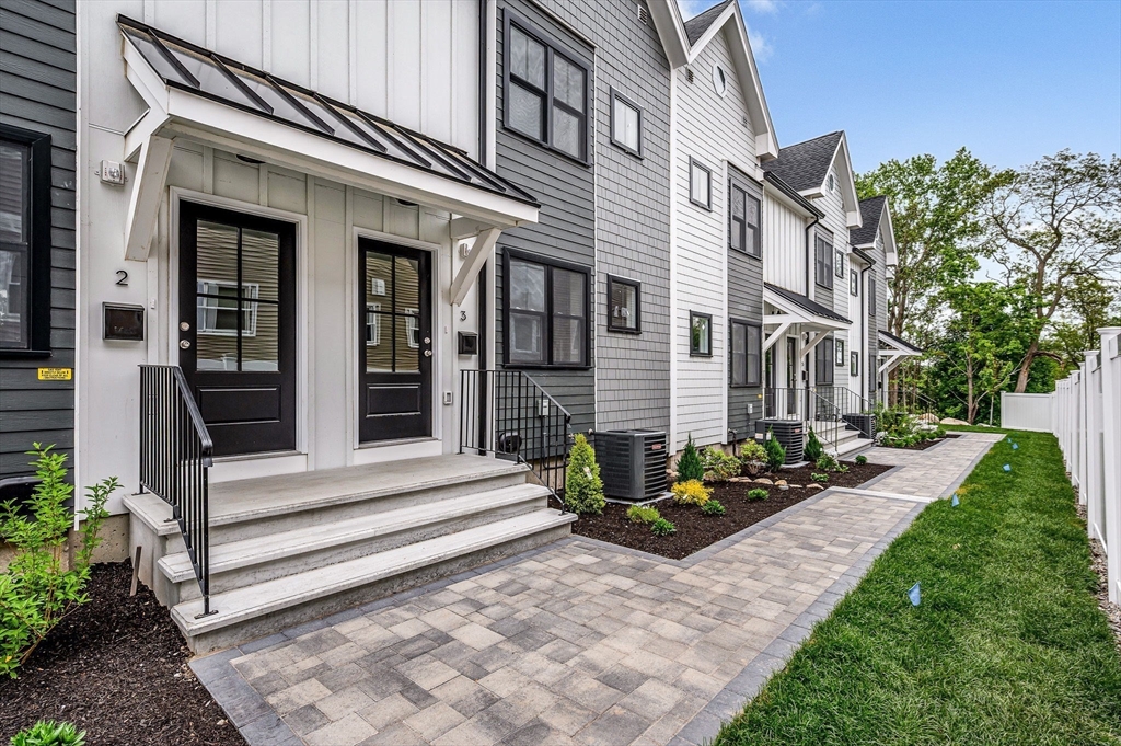 1514 Gorham Street, Unit 4 Lowell, MA 01852 - Photo 36 of 42 a view of a building with sitting area