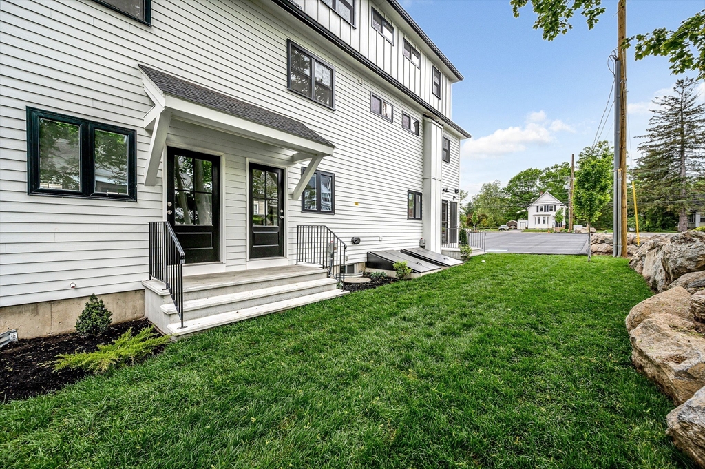 1514 Gorham Street, Unit 4 Lowell, MA 01852 - Photo 38 of 42 a view of a house with backyard