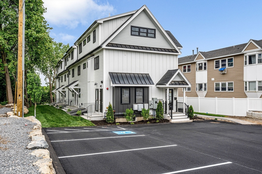 1514 Gorham Street, Unit 4 Lowell, MA 01852 - Photo 39 of 42 a view of multiple houses with a street