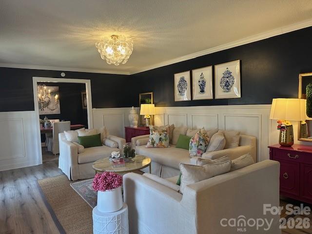 1414 Clark Place Lancaster, SC 29720 - Photo 14 of 41 a living room with furniture and a chandelier