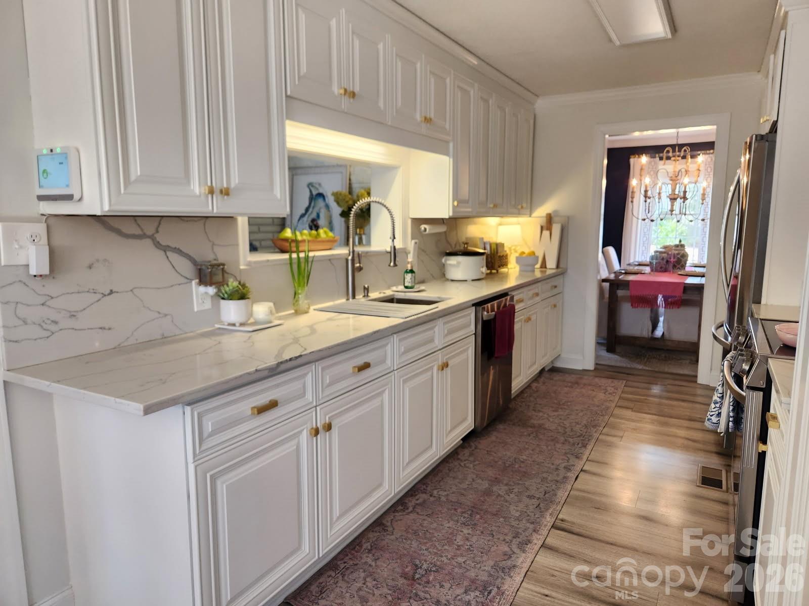 1414 Clark Place Lancaster, SC 29720 - Photo 16 of 41 a kitchen with sink and cabinets
