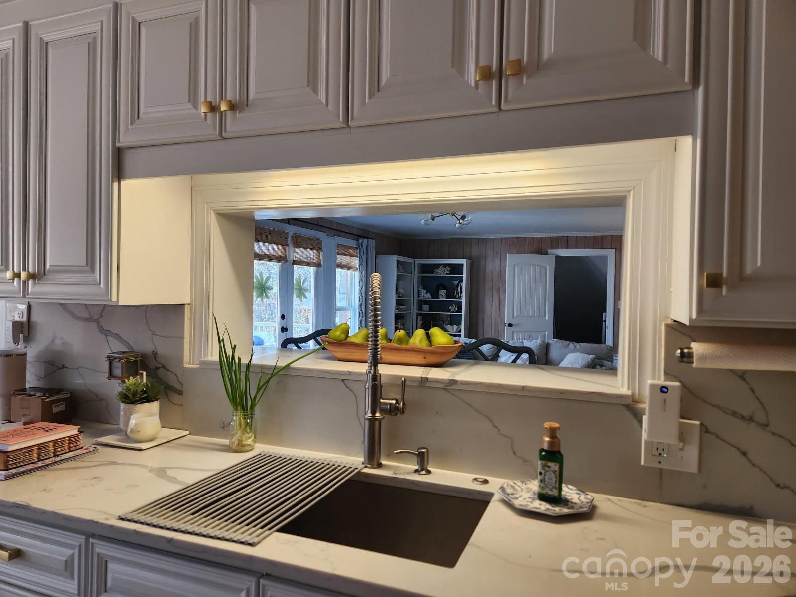 1414 Clark Place Lancaster, SC 29720 - Photo 18 of 41 a kitchen with a sink and cabinets