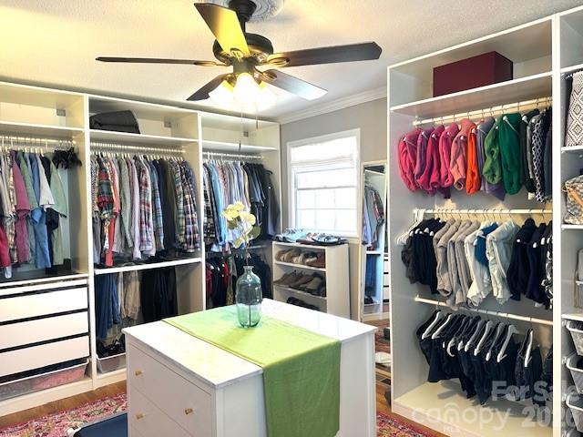 1414 Clark Place Lancaster, SC 29720 - Photo 27 of 41 a view of walk in closet with clothes and shoes