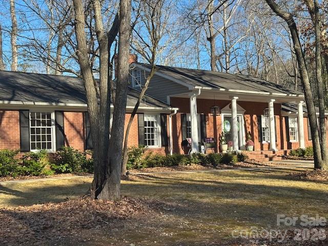 1414 Clark Place Lancaster, SC 29720 - Photo 3 of 41 a front view of a house with a yard