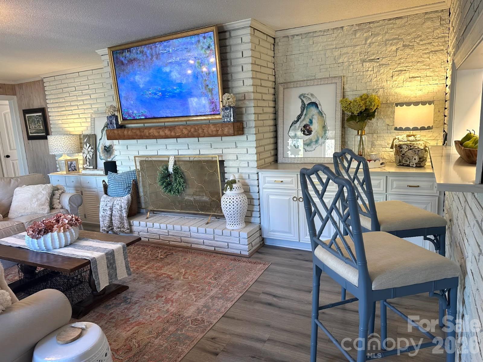 1414 Clark Place Lancaster, SC 29720 - Photo 10 of 41 a living room with furniture a table and a fireplace