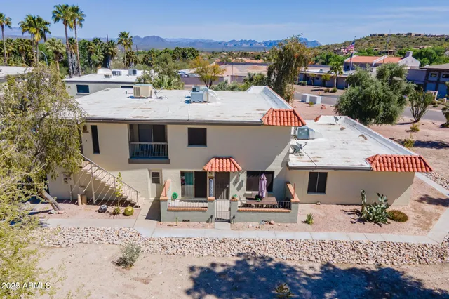 a view of house with outdoor space and swimming pool
