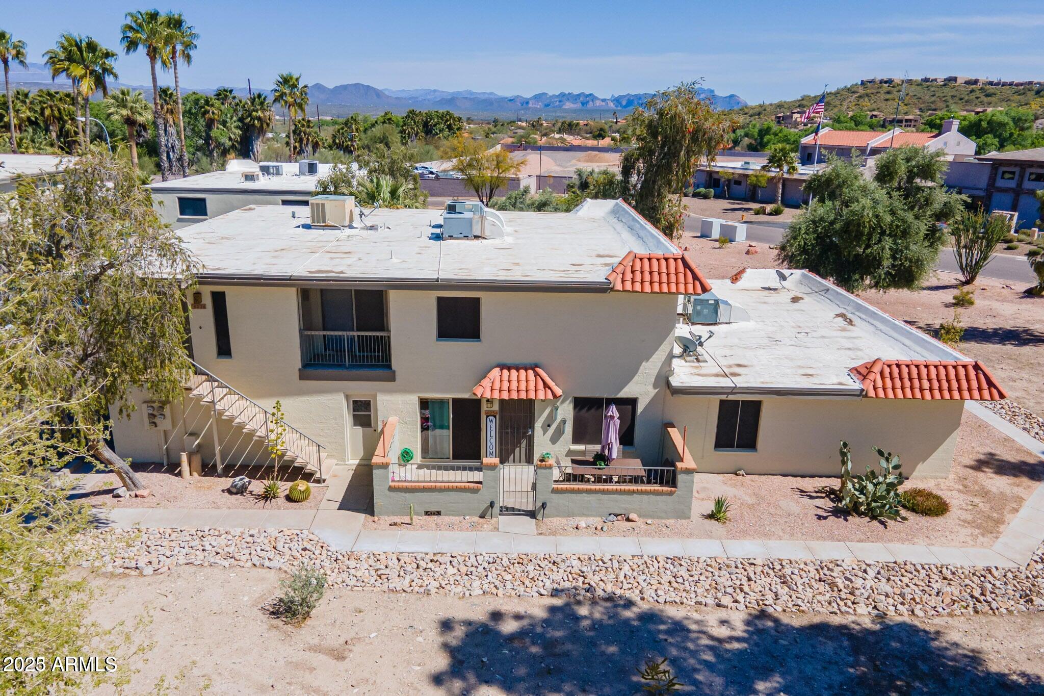 14234 North Oakwood Lane, Unit C Fountain Hills, AZ 85268 - Photo 19 of 22 a view of a house with a outdoor space