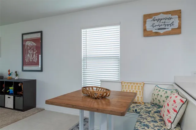 a view of a workspace with furniture