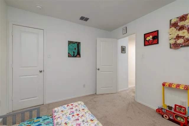 a bathroom with a sink toilet and a mirror