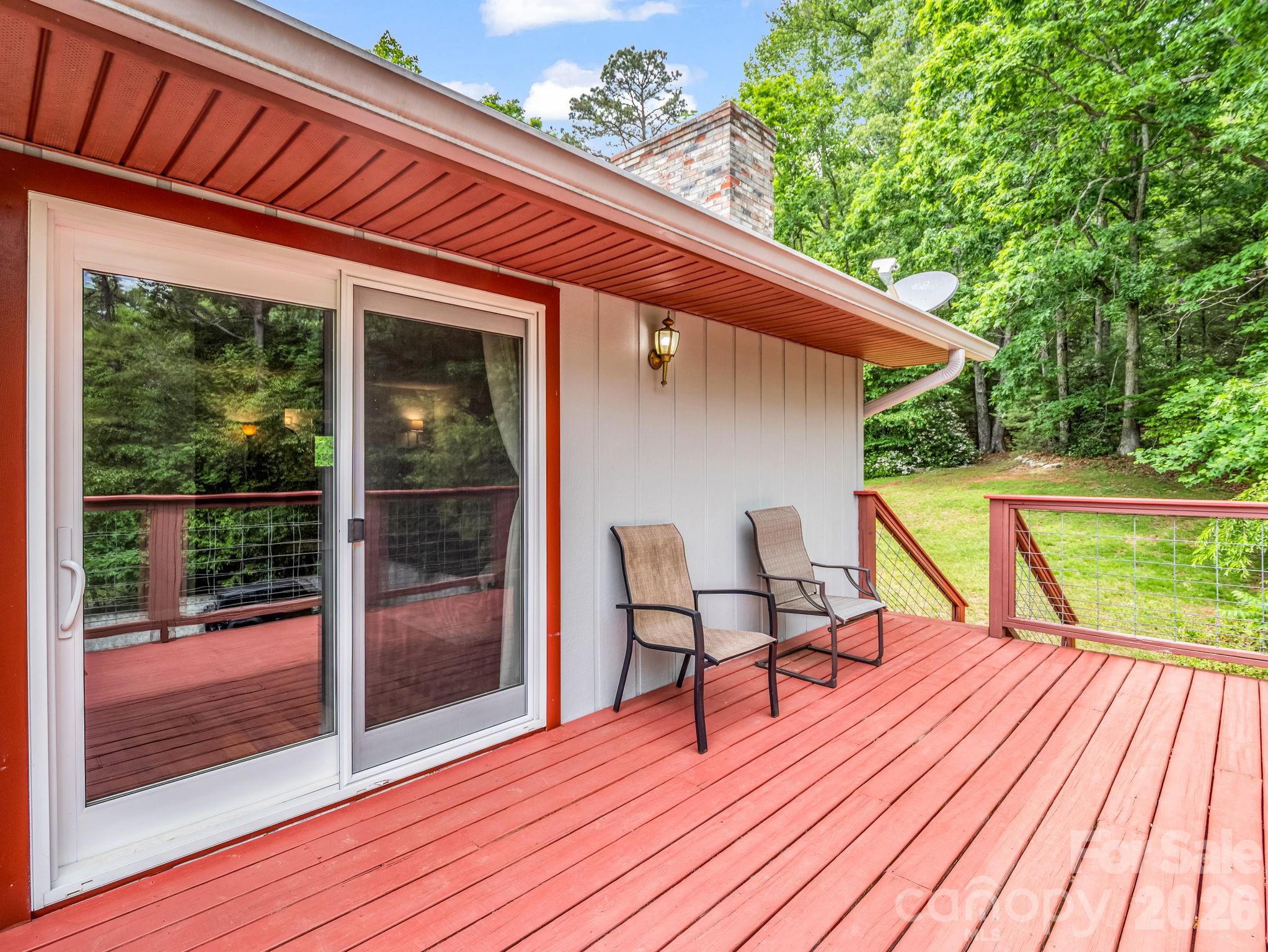 656 Cashiers Valley Road Brevard, NC 28712 - Photo 29 of 37 a view of a chairs and table on the wooden floor