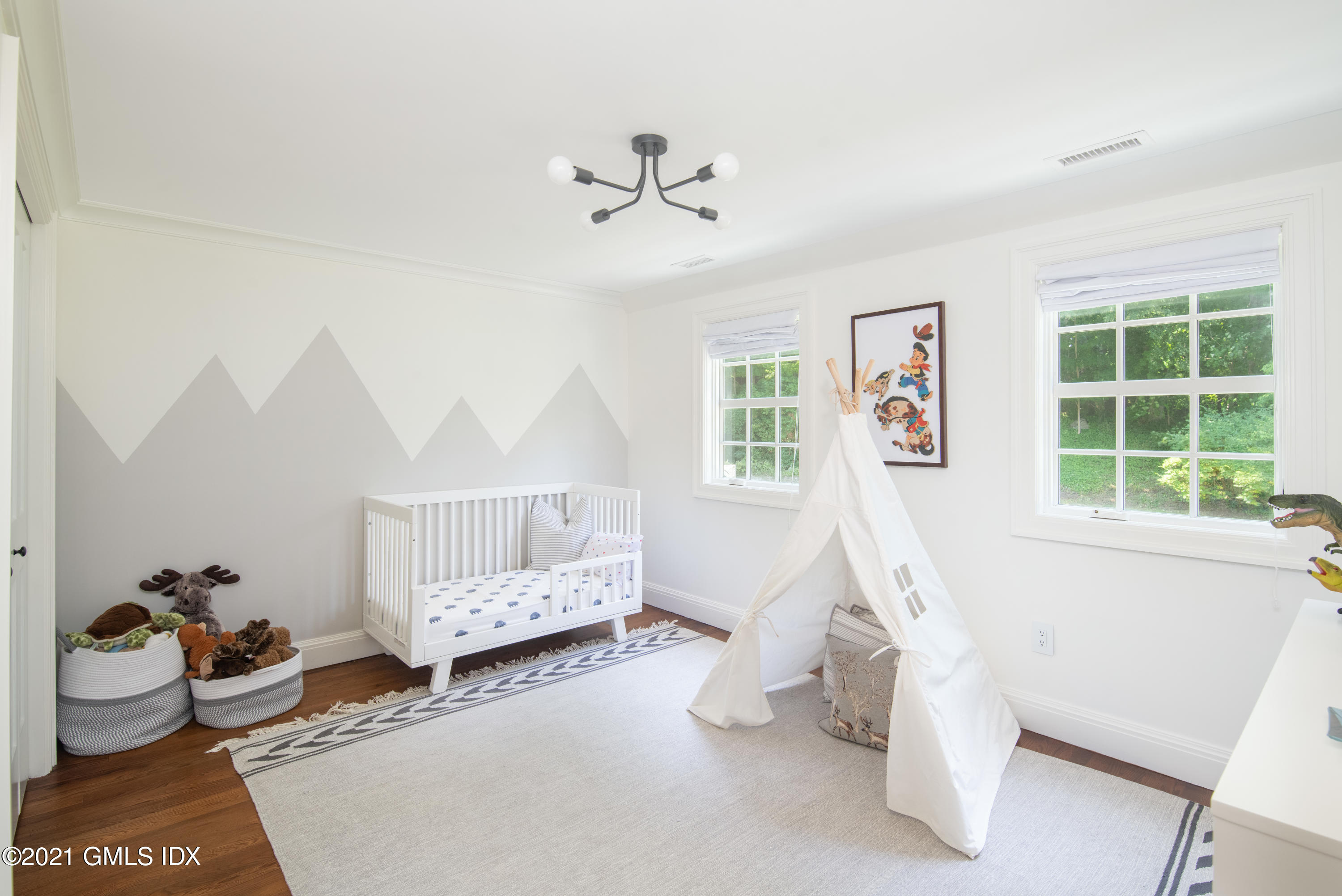 10 Pine Ridge Road Greenwich, CT 06830 - Photo 15 of 17 a bedroom with furniture and a window