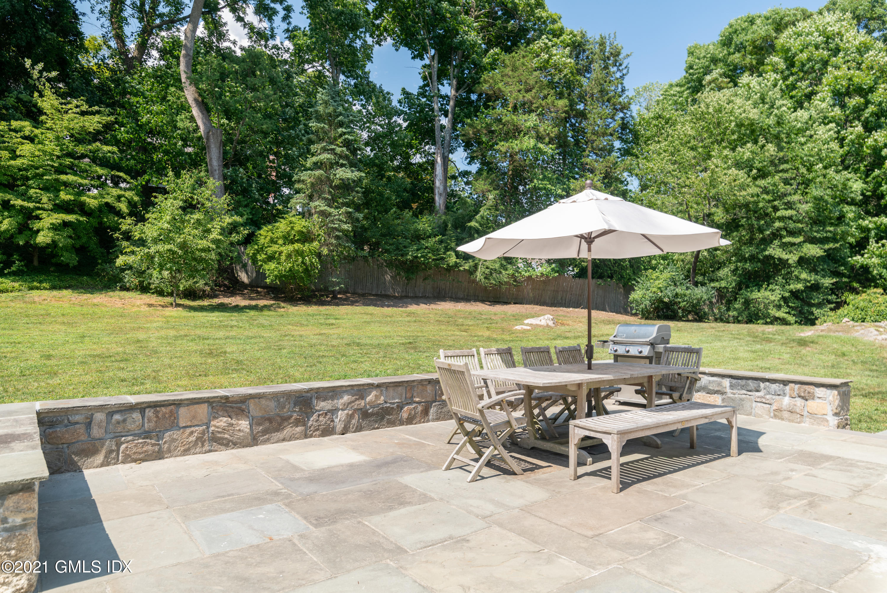 10 Pine Ridge Road Greenwich, CT 06830 - Photo 16 of 17 a view of a outdoor sitting area with chairs