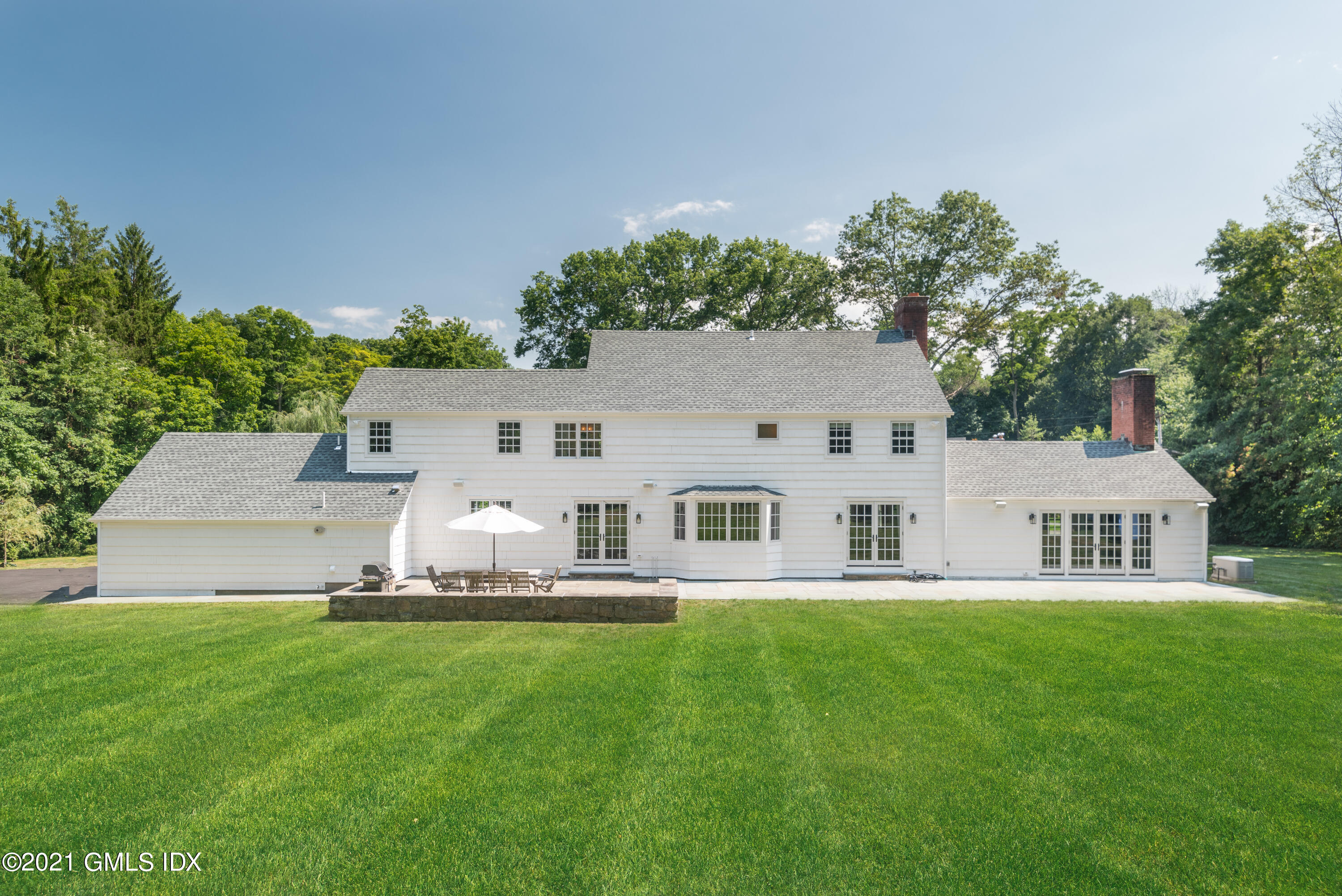 10 Pine Ridge Road Greenwich, CT 06830 - Photo 17 of 17 a house view with outdoor space and sitting space