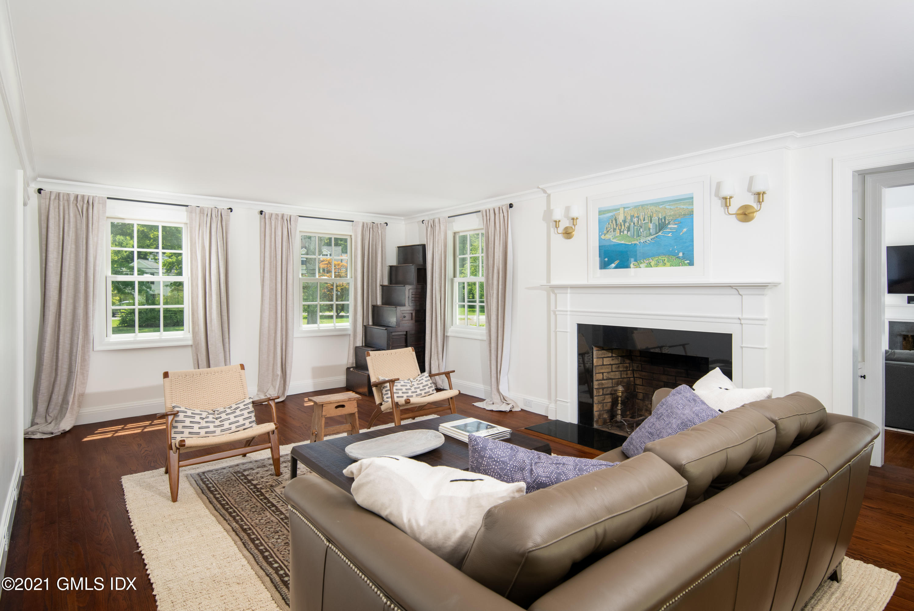 10 Pine Ridge Road Greenwich, CT 06830 - Photo 3 of 17 a living room with furniture and a fireplace